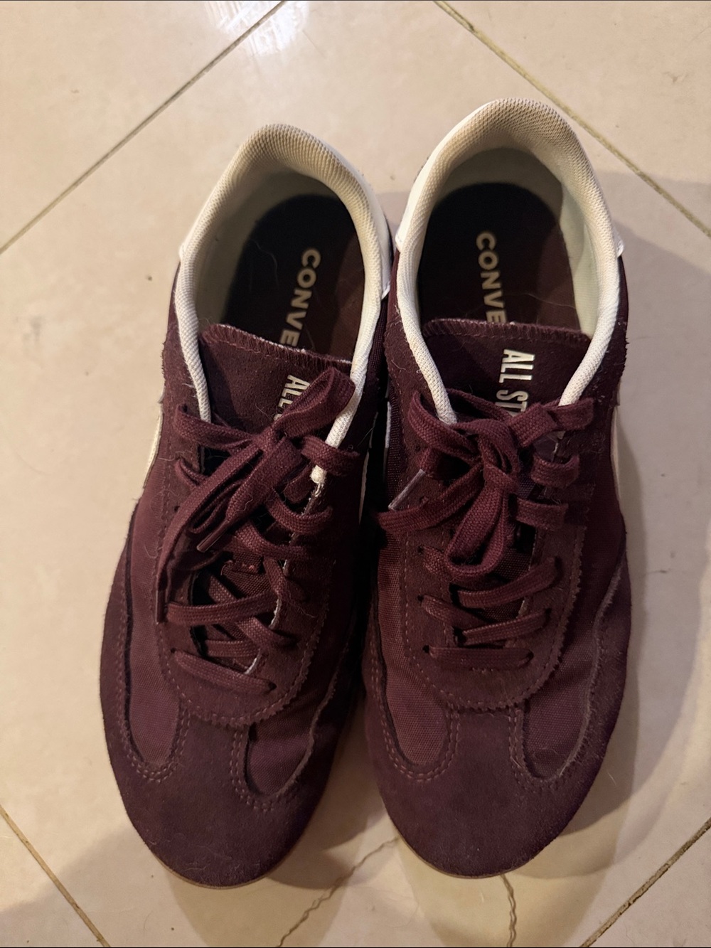Converse women’s Low-Top Suede Sneakers in Burgundy with White Trim